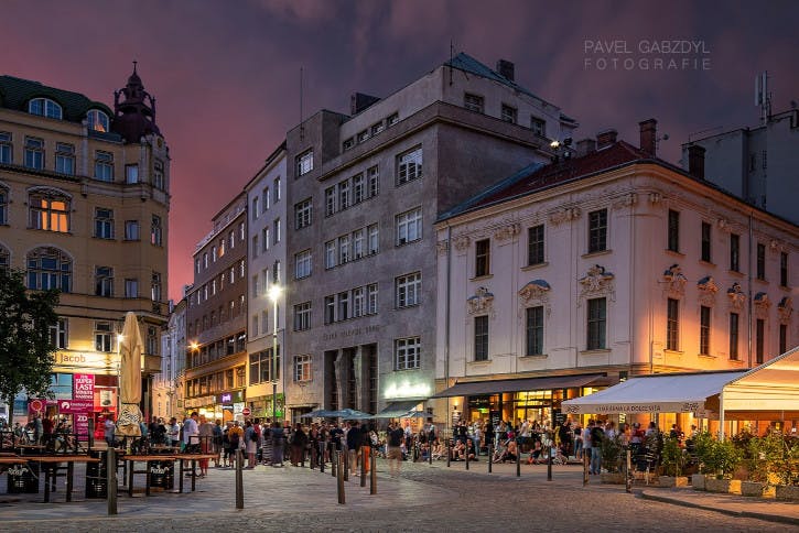 Image of Brno's street scene in the evening at sunset.